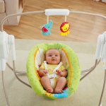 Electronic rocking cradle with baby